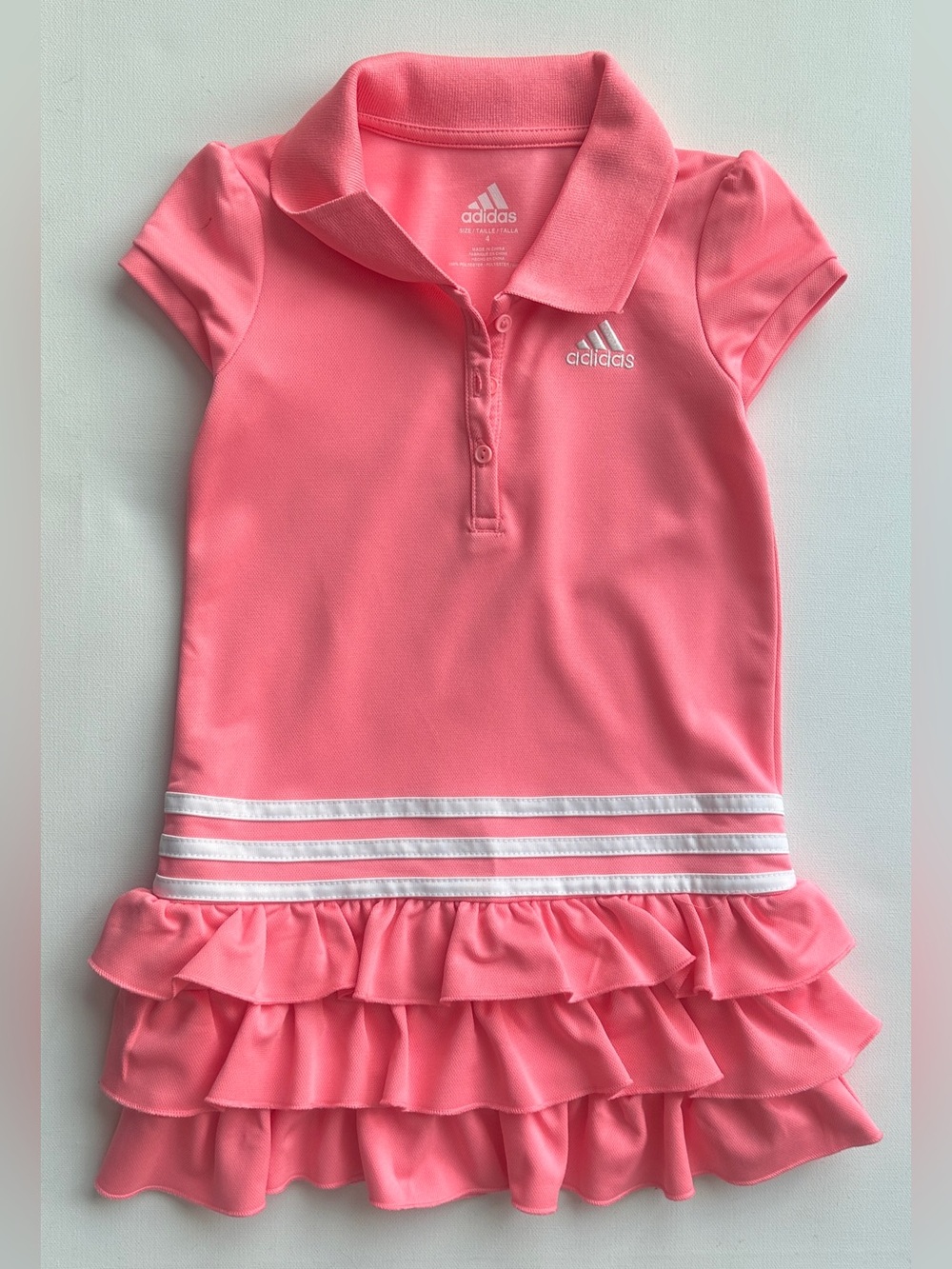 Adidas girl’s short sleeve ruffle polo dress.  Size 4T.